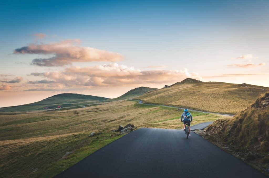 Cyclist riding through the Ribble Valley countryside
